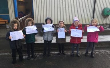 The naughty elf hid lots of things outside!